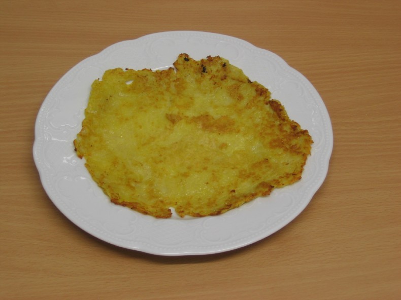Kartoffelpuffer auf Teller, Guten Appetit