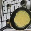 Kartoffelpuffer erste Seite fertig gebraten Kartoffelpuffer erste Seite fertig gebraten